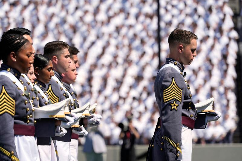 Graduating cadets stand during the playing of the national anthem at the U.S. Military Academy commencement ceremony, Saturday, May 25, 2024, in West Point, N.Y. (AP Photo/Alex Brandon)