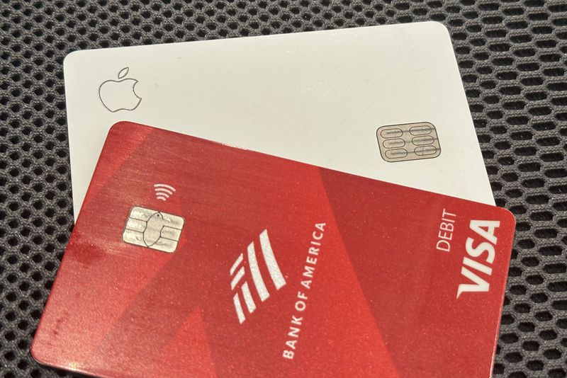 An Apple credit card is shown with a Visa debit card in a photo taken in New York on Tuesday, Sept. 24, 2024. (AP Photo/Peter Morgan)