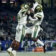 Grayson running back Jayvian Allen (16, left) celebrates a rushing touchdown with wide receiver Jamal Haynes in the first half of the Class 7A state high school football final against Collins Hill Wednesday, Dec. 30, 2020, at Center Parc Stadium in Atlanta. (Jason Getz/For the AJC)