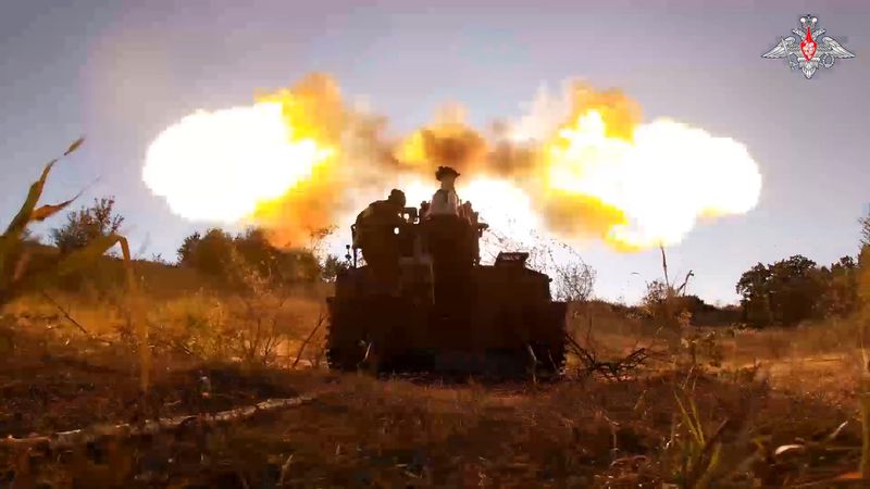 In this photo taken from video released by the Russian Defense Ministry on Sunday, Aug. 18, 2024, Russian soldiers fire Giatsint-S self-propelled gun towards Ukrainian positions at an undisclosed location in the Russian - Ukrainian border area in the Kursk region, Russia. (Russian Defense Ministry Press Service photo via AP)