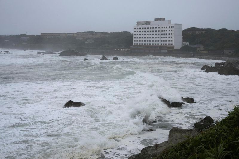 High waves hit a beach in Choshi, Chiba prefecture, east of Tokyo, as Typhoon Ampil moved past the area, Friday, Aug. 16, 2024. (Kyodo News via AP)