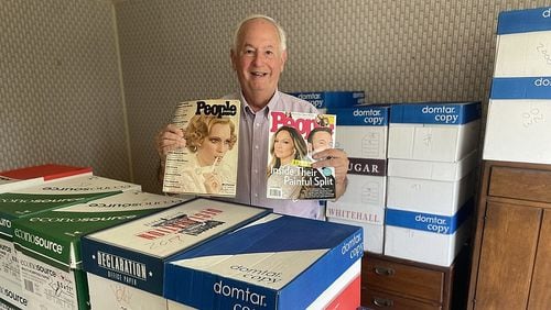 Wiley Couch is careful not to damage the pages, and he keeps the magazines in boxes arranged by year in the basement of his home. The boxes take up a whole room. (Photo Courtesy of Mark Kennedy)