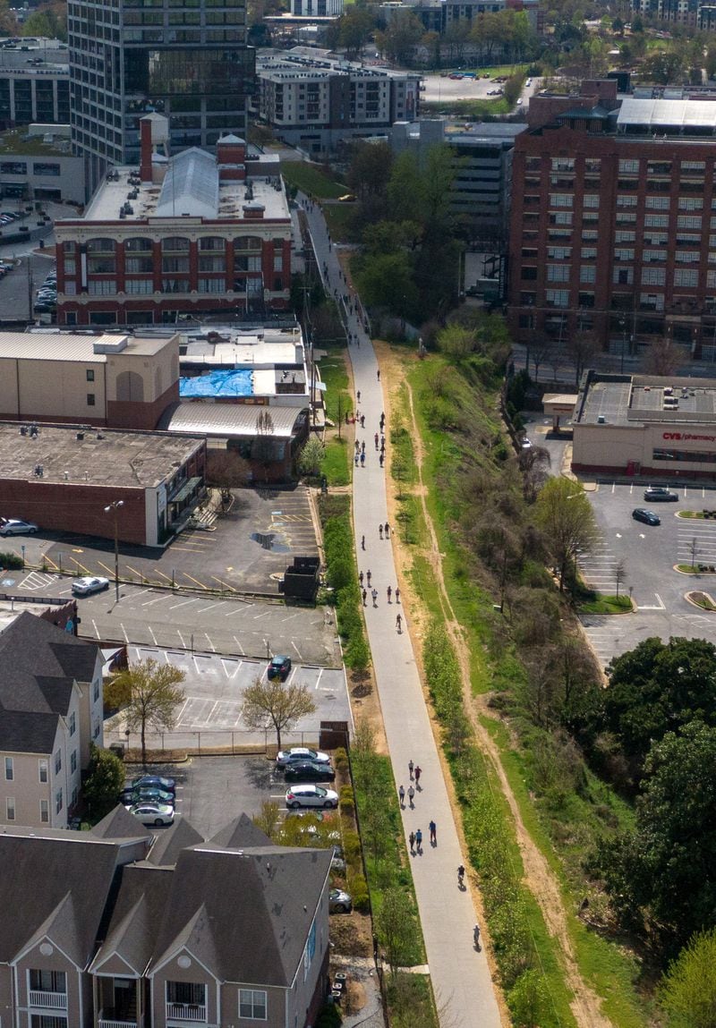 This aerial view shows residents walking, biking and exercising on the Eastside Trail side of the Beltline on Saturday, March 21, 2020, in Atlanta.  (Hyosub Shin / Hyosub.Shin@ajc.com)