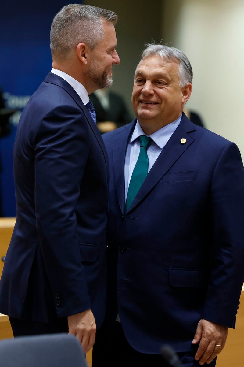 Hungary's Prime Minister Viktor Orban, right, speaks with Slovakia's President Peter Pellegrini during a round table meeting at an EU summit in Brussels, Monday, June 17, 2024. The 27 leaders of the European Union gather in Brussels on Monday evening to take stock of recent European election results and begin the fraught process of dividing up the bloc's top jobs, but they will be playing their usual political game with a deck of reshuffled cards. (AP Photo/Geert Vanden Wijngaert)