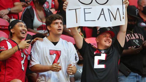 Young Falcons fans cheer their team during the first quarter against the Tennessee Titans in an NFL preseason football game on Friday, August 13, 2021, in Atlanta.   “Curtis Compton / Curtis.Compton@ajc.com”