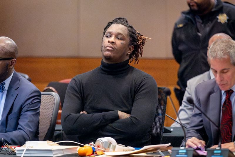 Young Thug, whose real name is Jeffery Williams, listens to Fulton County Chief Judge Ural Glanville as he tells the court his trial is on hold after one of the defendants was stabbed while in jail. (Steve Schaefer/steve.schaefer@ajc.com)