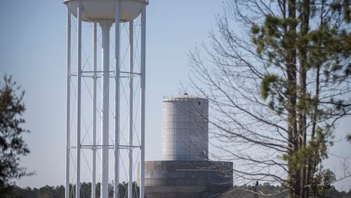 A water tower under construction, center, at the edge of the Hyundai Metaplant site that will be used to hold groundwater pumped from Bulloch County, Wednesday, Feb. 21, 2024, Ellabell, Ga. (AJC Photo/Stephen B. Morton)