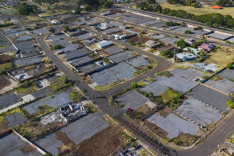 FILE - A general view of the burn zone after the completion of residential primary debris removal and the beginning of commercial debris removal, Saturday, July 6, 2024, in Lahaina, Hawaii. (AP Photo/Mengshin Lin, File)