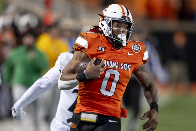 FILE - Oklahoma State running back Ollie Gordon II (0) runs for a touchdown during the second half of an NCAA college football game against Cincinnati Saturday, Oct. 28, 2023, in Stillwater, Okla. (AP Photo/Mitch Alcala, File)