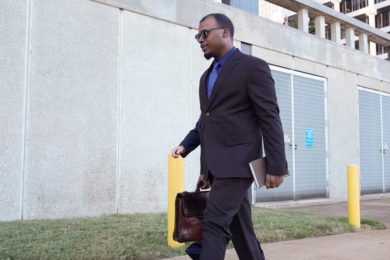 Justin Smith, one of three former Memphis police officers charged in the 2023 fatal beating of Tyre Nichols, arrives at the federal courthouse for the day's proceedings Wednesday, Oct. 2, 2024, in Memphis, Tenn. (AP Photo/George Walker IV)