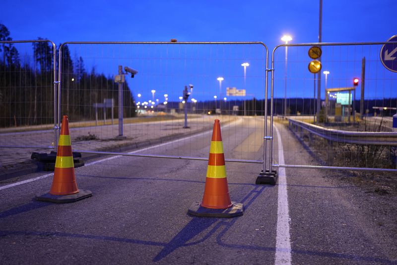 FILE - A view of a fence blocking the road to the closed empty Nuijamaa border station between Russia and Finland in Lappeenranta, Finland, Nov. 18, 2023. (AP Photo/Sergei Grits, file)