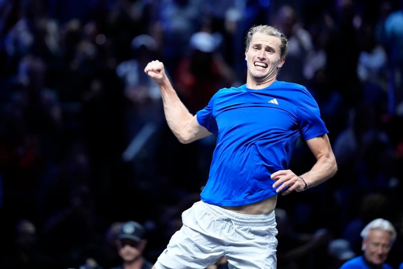 Team Europe's Alexander Zverev celebrates after winning against Team World's Frances Tiafoe on the third day of the Laver Cup tennis tournament, at the Uber arena in Berlin, Germany, Sunday, Sept. 22, 2024. (AP Photo/Ebrahim Noroozi)