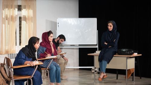 From left, "English" characters played by Sade Namei, Sayé Yabandeh, Ash Kahn and Pooyah Mohseni speak in quick, natural English when the characters are using Farsi and heavily accented, broken, difficult English when the students are attempting to learn the new language. Photo: Greg Mooney