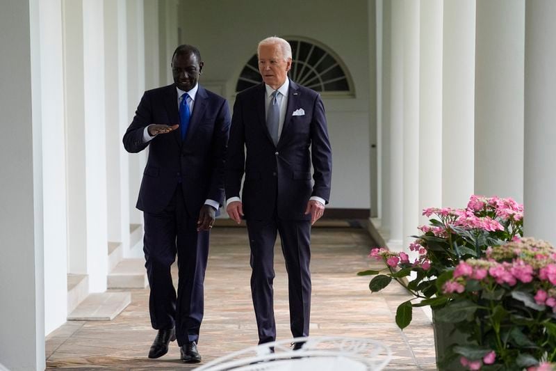 President Joe Biden and Kenya's President William Ruto walk along the Colonnade around the Rose Garden on their way to the Oval Office for a meeting after a State Arrival Ceremony at the White House, Thursday, May 23, 2024, in Washington. (AP Photo/Evan Vucci, Pool)