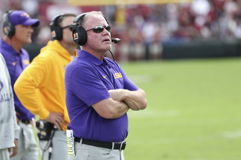 LSU head coach Brian Kelly looks at the scoreboard after a South Carolina touchdown during the first half of an NCAA college football game Saturday, Sept. 14, 2024 in Columbia, S.C. (AP Photo/Artie Walker Jr.)