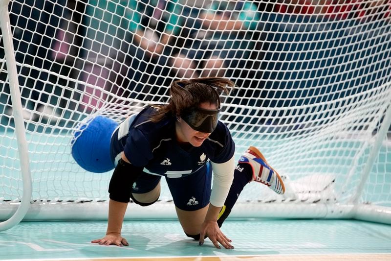 Gwendoline Matos of France competes during the Women's preliminary round Goalball game against Canada at the 2024 Paralympics, Thursday, Aug. 29, 2024, in Paris, France. (AP Photo/Christophe Ena)