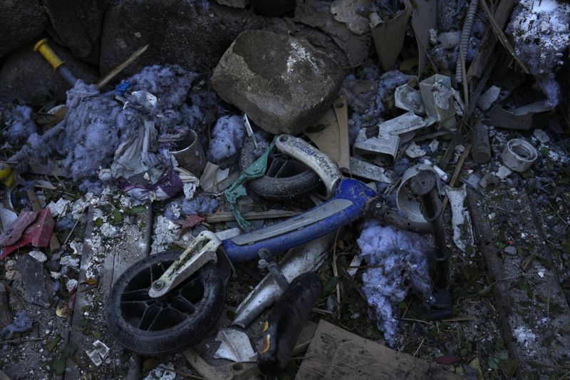 Household items lie destroyed at a home after rockets struck in Katzrin, in the the Israeli-annexed Golan Heights, Wednesday, Aug. 21, 2024. Lebanon's Hezbollah has launched more than 50 rockets, hitting a number of private homes in the area.(AP Photo/Ariel Schalit)