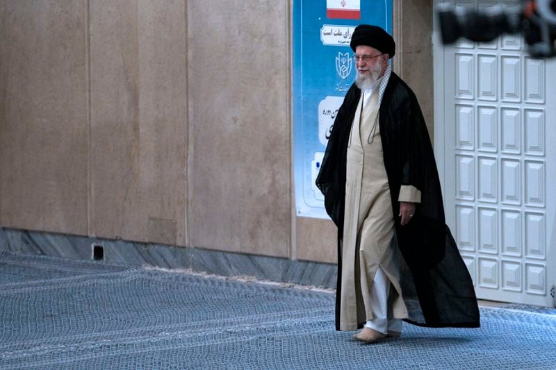 Iranian Supreme Leader Ayatollah Ali Khamenei arrives to vote for the presidential election, in Tehran, Iran, Friday, June 28, 2024. Iranians voted Friday in a snap election to replace the late hard-line President Ebrahim Raisi, with the race's sole reformist candidate vowing to seek "friendly relations" with the West in an effort to boost his campaign. (AP Photo/Vahid Salemi)