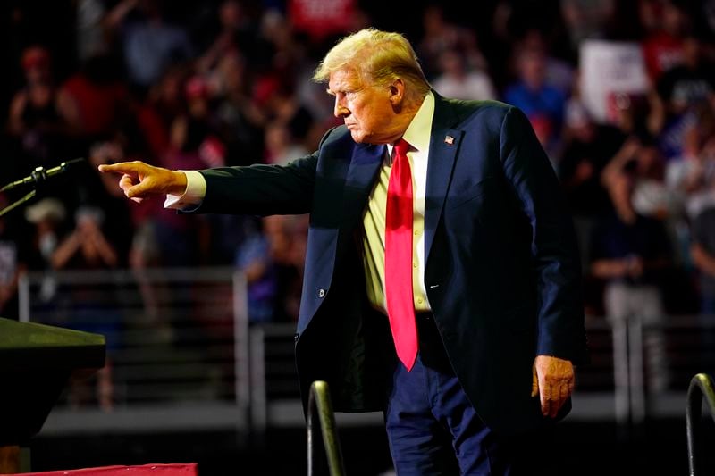 Republican presidential candidate former President Donald Trump gestures to the crowd at a campaign rally, Saturday, June 22, 2024, at Temple University in Philadelphia. (AP Photo/Chris Szagola)