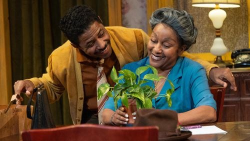 Amari Cheatom (left) and Jen Harper star in "A Raisin in the Sun," a coproduction of Theatrical Outfit and Dominion Entertainment, running at Theatrical Outfit through Oct. 6. (Courtesy of Casey Gardner Ford)