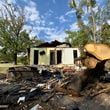 Part of the oak tree that slammed down on a Sandersville home during Hurricane Helene and killed two children, Harmony Taylor, 7, and her brother Derrick, 4.