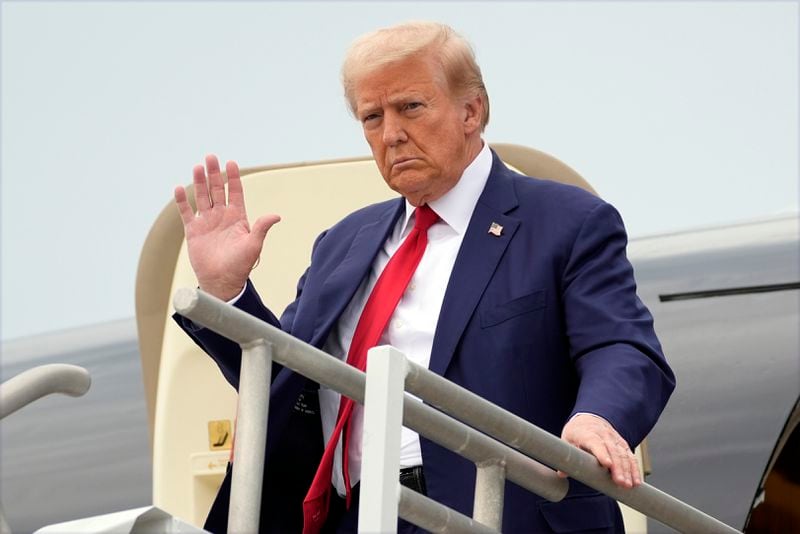 Republican presidential nominee former President Donald Trump arrives at Augusta Regional Airport to visit areas impacted by Hurricane Helene, Friday, Oct. 4, 2024, in Augusta, Ga. (AP Photo/Evan Vucci)