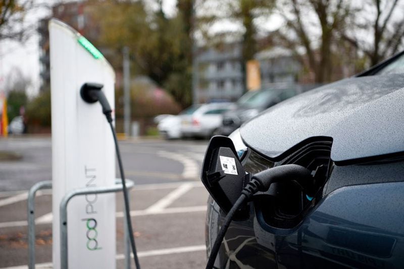 The slow buildout of EV charging stations infrastructure is affecting sales, experts say. (Photo by DANIEL LEAL-OLIVAS/AFP via Getty Images/TNS)