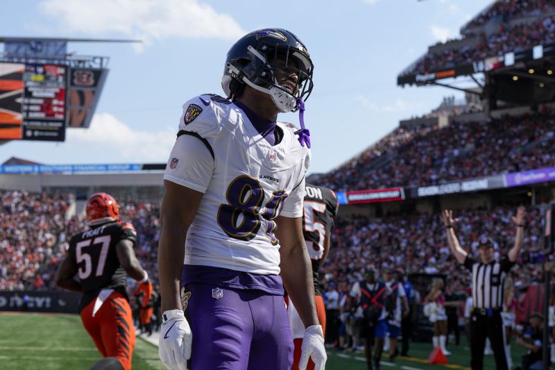 Baltimore Ravens tight end Isaiah Likely reacts after making a touchdown catch against the Cincinnati Bengals during the second half of an NFL football game, Sunday, Oct. 6, 2024, in Cincinnati. (AP Photo/Jeff Dean)