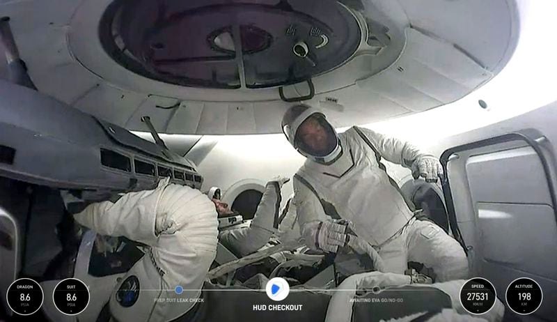 This image made from a SpaceX video shows the crew of the first private spacewalk led by tech billionaire Jared Isaacman inside the capsule, Thursday Sept. 12, 2024. (SpaceX via AP)