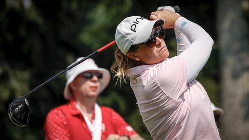 Lauren Coughlin, of the United States, hits a tee shot on the seventh hole during the second round at the LPGA Canadian Women's Open golf tournament in Calgary, Alberta, Friday, July 26, 2024. (Jeff McIntosh/The Canadian Press via AP)