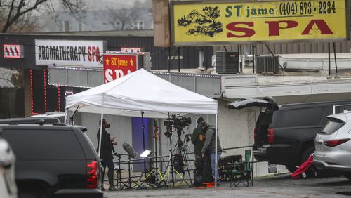 Members of the media set up near the spas where a gunman opened fire Tuesday evening on Piedmont Road in Atlanta, killing four women. (John Spink / John.Spink@ajc.com)