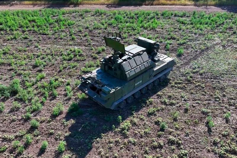 In this photo taken from video released by Russian Defense Ministry press service on Thursday, Aug. 22, 2024, a Tor M2 anti-aircraft missile system drives in an undisclosed location. (Russian Defense Ministry Press Service via AP)