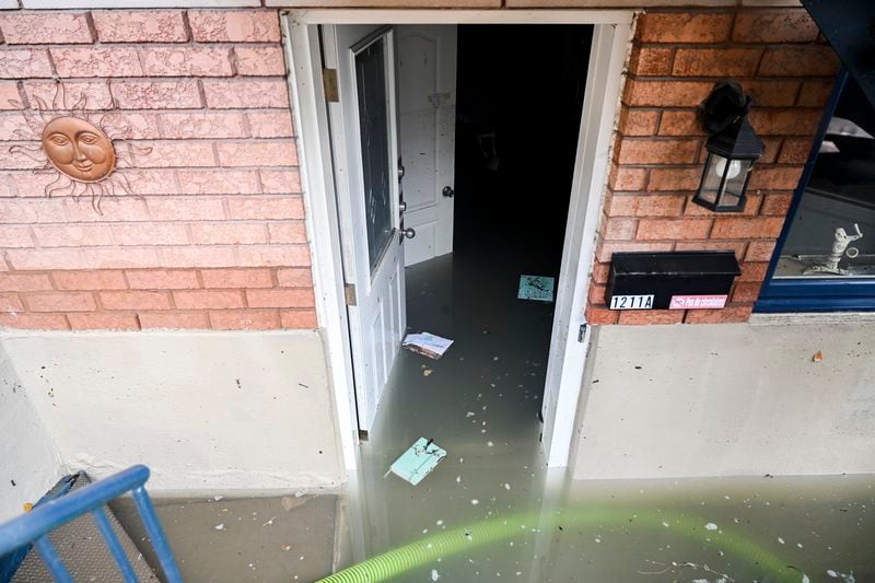 A flooded basement apartment is shown following a water main break on a street in Montreal, Friday, Aug. 16, 2024, causing flooding in several streets of the area. (Graham Hughes/The Canadian Press via AP)