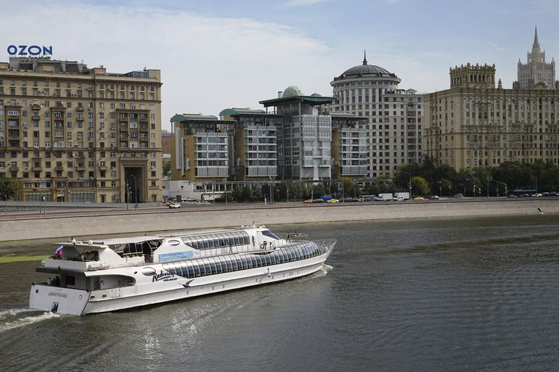 A boats floats past the British Embassy building, centre, in Moscow, Russia, Friday, Sept. 13, 2024, with the Russian Foreign Ministry building in the right. (AP Photo)