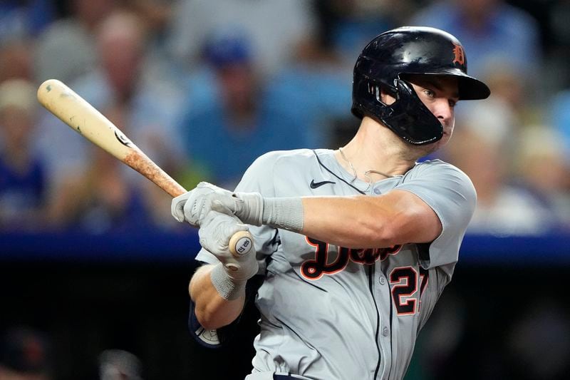 Detroit Tigers' Trey Sweeney watches his two-run double during the third inning of a baseball game against the Kansas City Royals Wednesday, Sept. 18, 2024, in Kansas City, Mo. (AP Photo/Charlie Riedel)