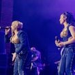 Atlanta's own TLC -- Tionne "T-Boz" Watkins and Rozonda "Chili" Thomas -- perform before a packed audience Saturday at the Stockbridge Amphitheater in Henry County.