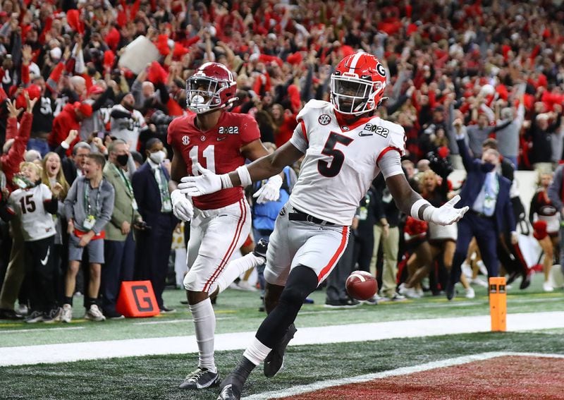 Georgia defensive back Kelee Ringo intercepts Alabama and returns it for a touchdown.  “Curtis Compton / Curtis.Compton@ajc.com”`