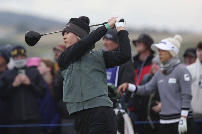 Nelly Korda, of the United States, plays off the 13th hole during the final round of the Women's British Open golf championship, in St. Andrews, Scotland, Sunday, Aug. 25, 2024. (AP Photo/Scott Heppell)