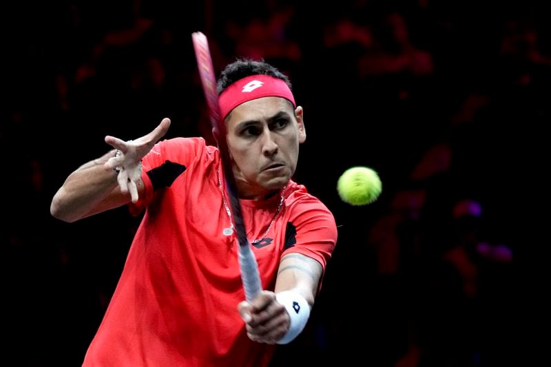 Team World's Alejandro Tabilo returns the ball during his singles tennis match against team Europe's Grigor Dimitrov on the first day of the Laver Cup tennis tournament at the Uber arena in Berlin, Germany, Friday, Sept. 20, 2024. (AP Photo/Ebrahim Noroozi)