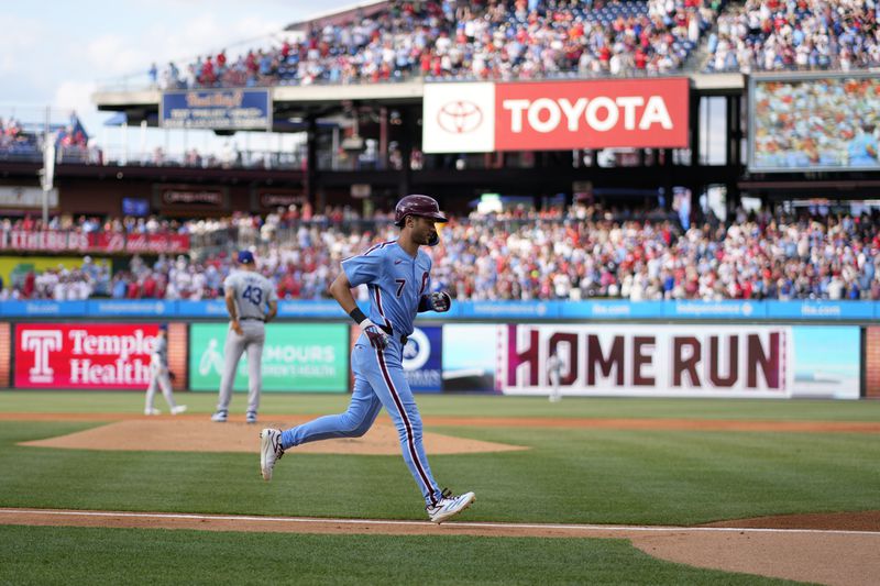 Philadelphia Phillies' Trea Turner rounds the bases after hitting a home run against Los Angeles Dodgers pitcher Anthony Banda during the first inning of a baseball game, Thursday, July 11, 2024, in Philadelphia. (AP Photo/Matt Slocum)
