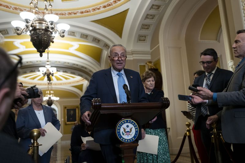 Senate Majority Leader Chuck Schumer, D-NY, speaks to the media following the Senate Democratic Party policy luncheon at Capitol Hill in Washington, Tuesday, Sept. 17, 2024. (AP Photo/Ben Curtis)