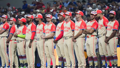 FILE - American League players line up before the MLB All-Star baseball game, July 16, 2024, in Arlington, Texas. (AP Photo/LM Otero, File)