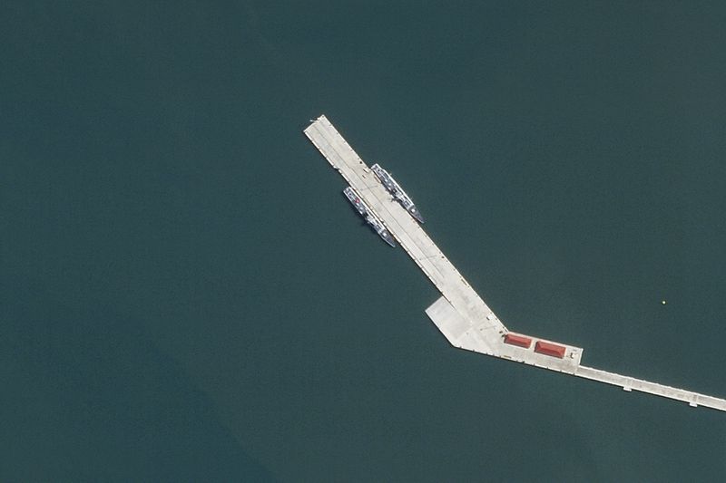 FILE - This satellite photo taken by Planet Labs PBC shows two Chinese corvettes docked at the Ream Naval Base, Cambodia, on the Gulf of Thailand, May 8, 2024. (Planet Labs PBC via AP, File)