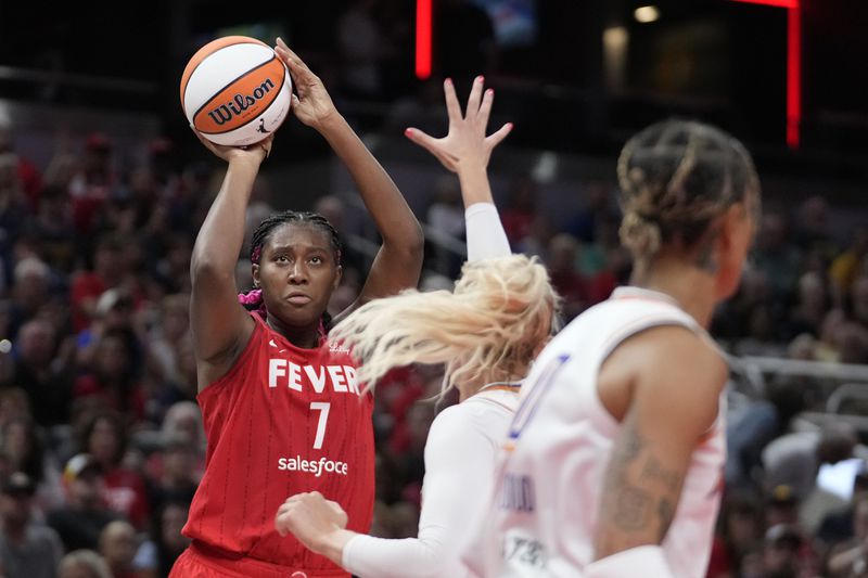 Indiana Fever's Aliyah Boston (7) shoots during the second half of a WNBA basketball game against the Phoenix Mercury, Friday, Aug. 16, 2024, in Indianapolis. (AP Photo/Darron Cummings)