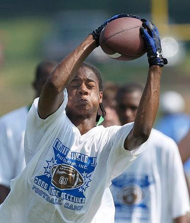 Calvin Johnson hosts youth football camp