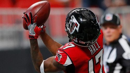 Falcons wide receiver Marvin Hall pulls in a 40-yard touchdown reception against the Dolphins Oct. 15, 2017, at Mercedes-Benz Stadium.