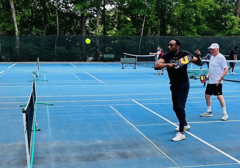 Mayor Andre Dickens plays pickleball