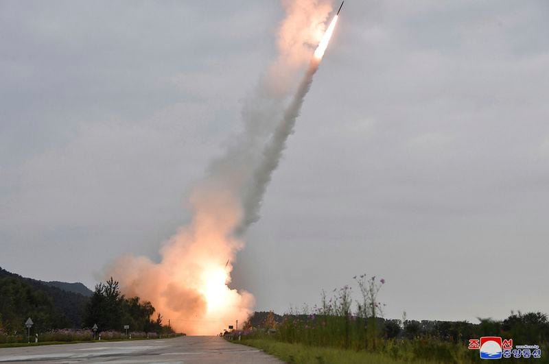 This undated photo provided on Friday, Sept. 13, 2024, by the North Korean government shows what they say is test-firing from their new launch vehicle of 600mm multiple rockets at an undisclosed location in North Korea. Independent journalists were not given access to cover the event depicted in this image distributed by the North Korean government. The content of this image is as provided and cannot be independently verified. Korean language watermark on image as provided by source reads: "KCNA" which is the abbreviation for Korean Central News Agency. (Korean Central News Agency/Korea News Service via AP)