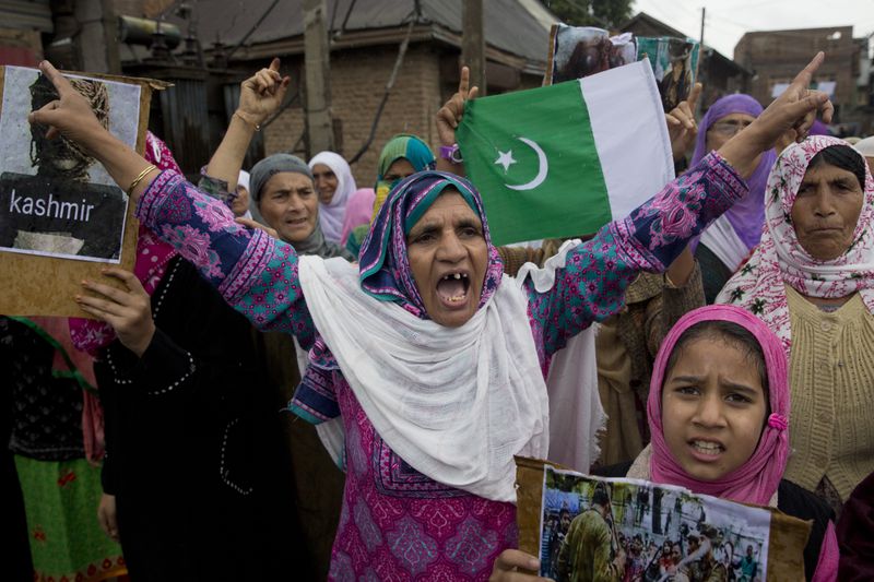 Kashmiris shout slogans during a protest after Friday prayers against the abrogation of article 370, on the outskirts of Srinagar, Indian controlled Kashmir, Friday, Oct. 4, 2019.(AP Photo/ Dar Yasin, File)