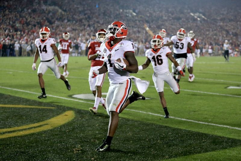 PASADENA, CA - JANUARY 01: Sony Michel #1 of the Georgia Bulldogs scores the winning touchdown in the 2018 College Football Playoff Semifinal Game against the Oklahoma Sooners at the Rose Bowl Game presented by Northwestern Mutual at the Rose Bowl on January 1, 2018 in Pasadena, California.  (Photo by Sean M. Haffey/Getty Images)